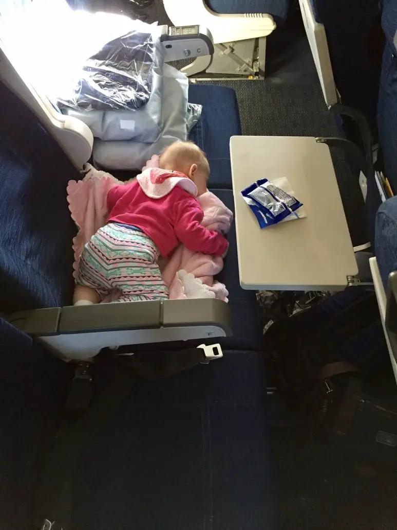 Airplane flying with a baby